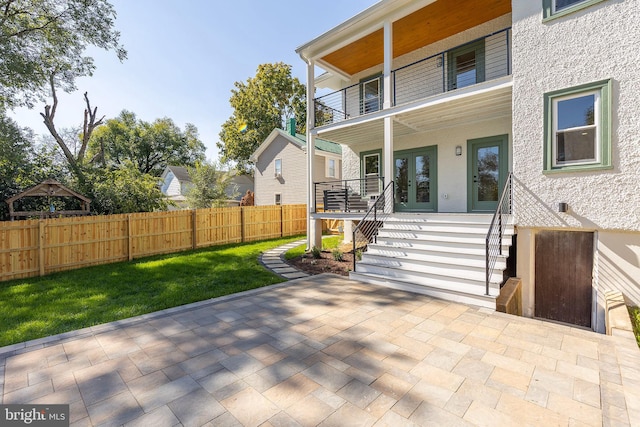 exterior space featuring a balcony