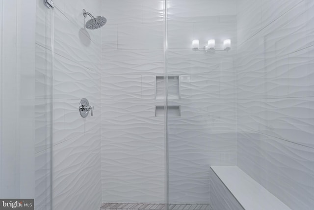 bathroom featuring an enclosed shower