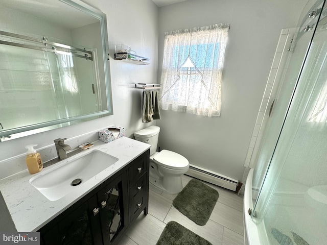 bathroom with tile patterned flooring, vanity, an enclosed shower, and a baseboard radiator