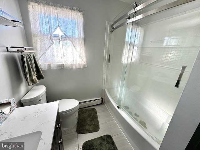 full bathroom featuring baseboard heating, tile patterned flooring, toilet, shower / bath combination with glass door, and vanity