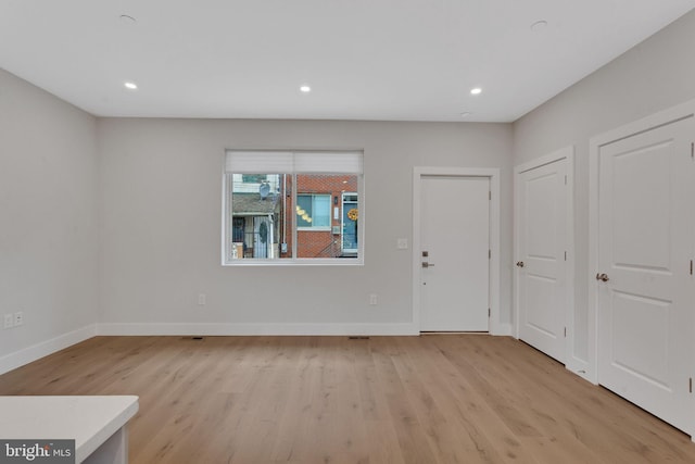 entrance foyer featuring light hardwood / wood-style floors