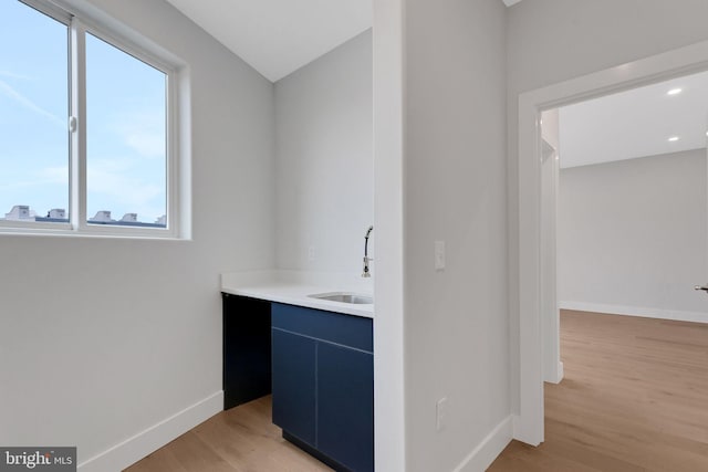 bathroom featuring vanity and hardwood / wood-style flooring