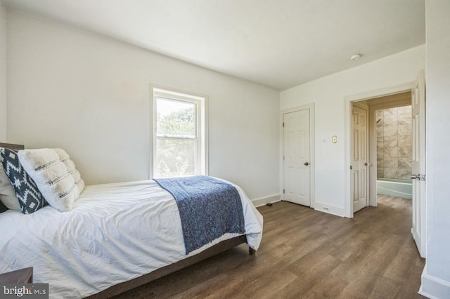 bedroom featuring hardwood / wood-style floors