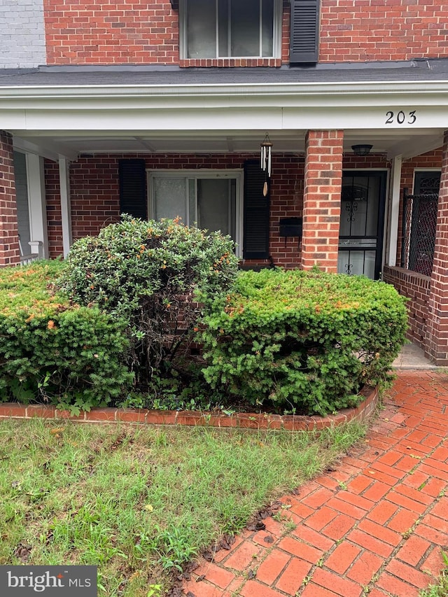 entrance to property with covered porch