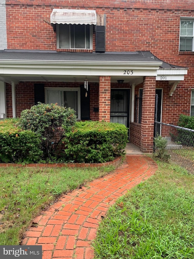 entrance to property with a porch