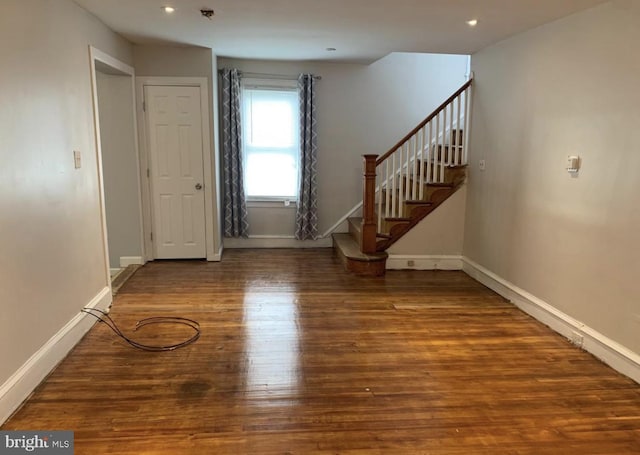 foyer entrance featuring hardwood / wood-style flooring