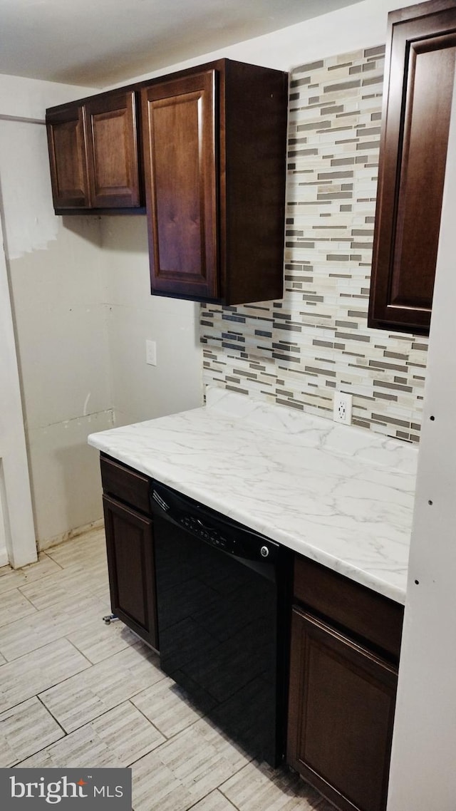 kitchen with backsplash, dark brown cabinets, and dishwasher