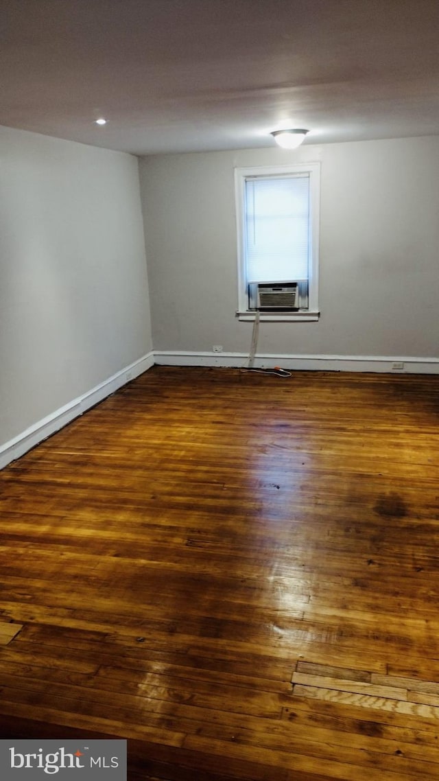 empty room featuring dark hardwood / wood-style floors