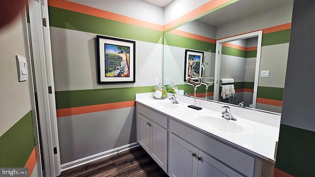 bathroom with vanity and hardwood / wood-style flooring