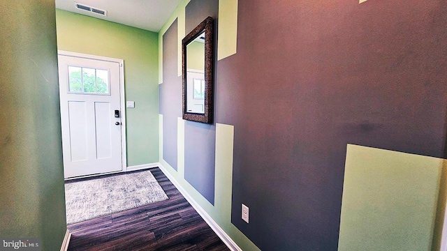 entryway with dark hardwood / wood-style floors