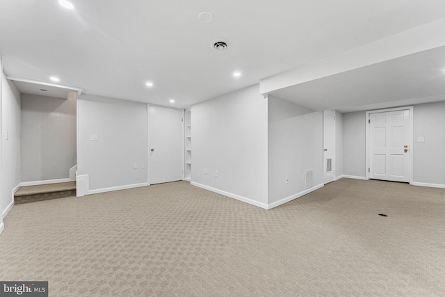 basement featuring carpet floors