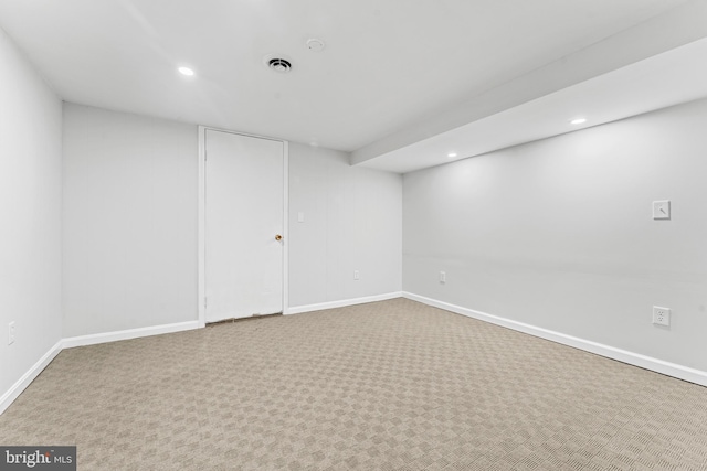 basement featuring carpet