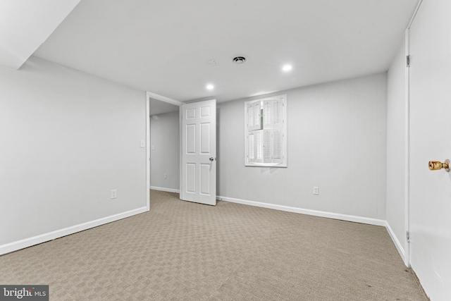 basement with light carpet