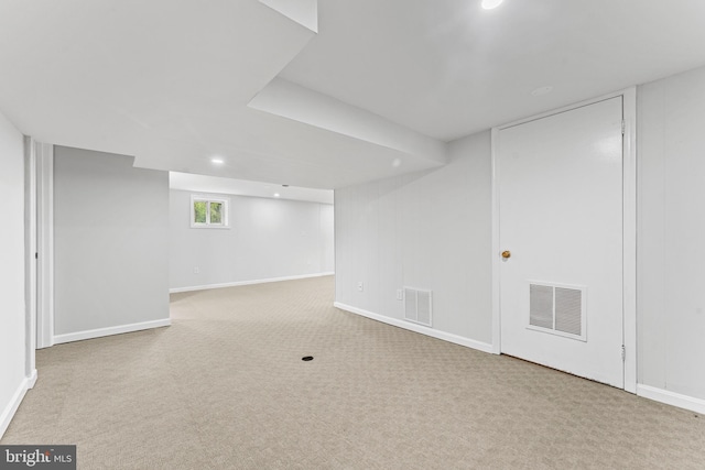 basement with light carpet