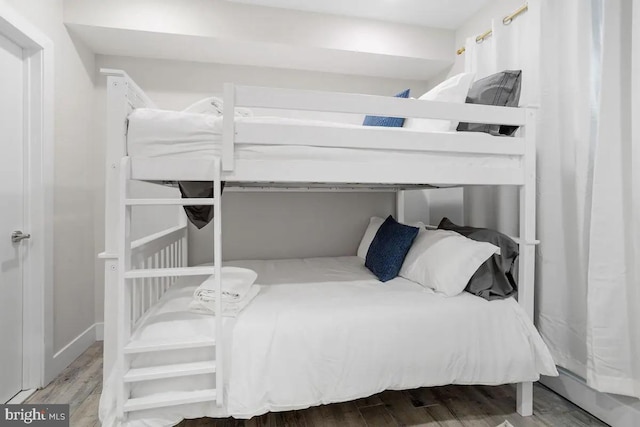 bedroom featuring hardwood / wood-style floors