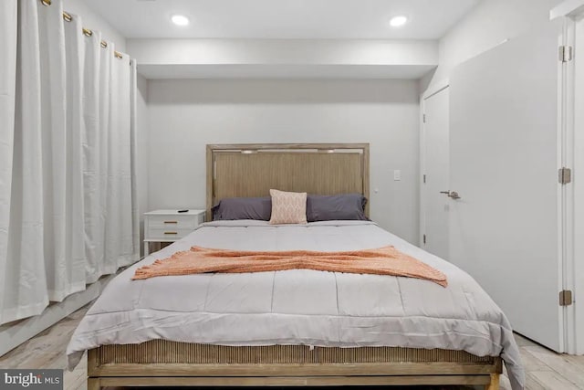 bedroom featuring light wood-type flooring