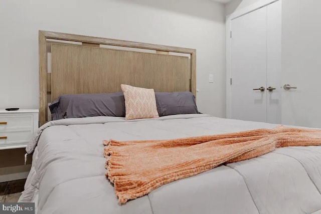 bedroom featuring hardwood / wood-style flooring