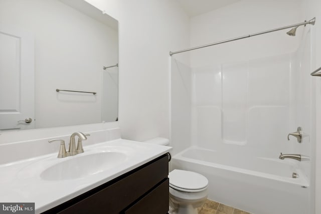 full bathroom with washtub / shower combination, vanity, and toilet