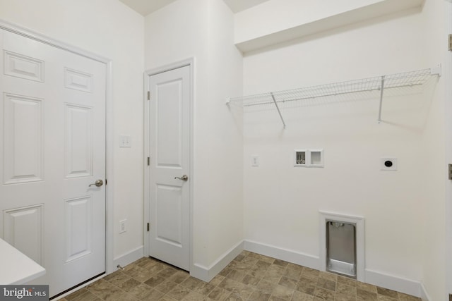 laundry room featuring washer hookup, baseboards, laundry area, and electric dryer hookup
