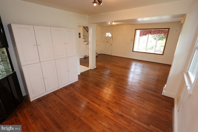 interior space featuring dark hardwood / wood-style flooring