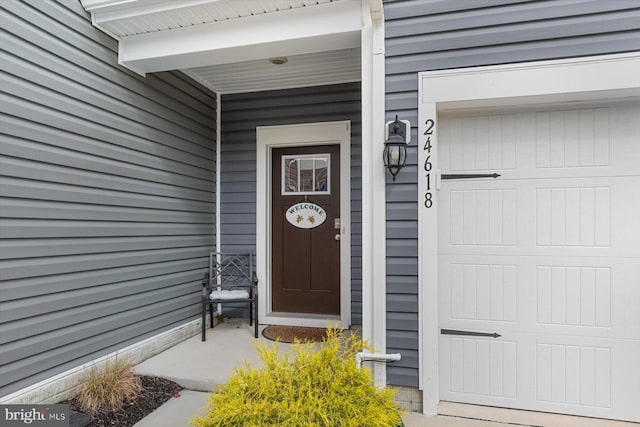 entrance to property with a garage