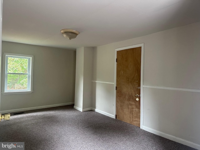 spare room with carpet flooring