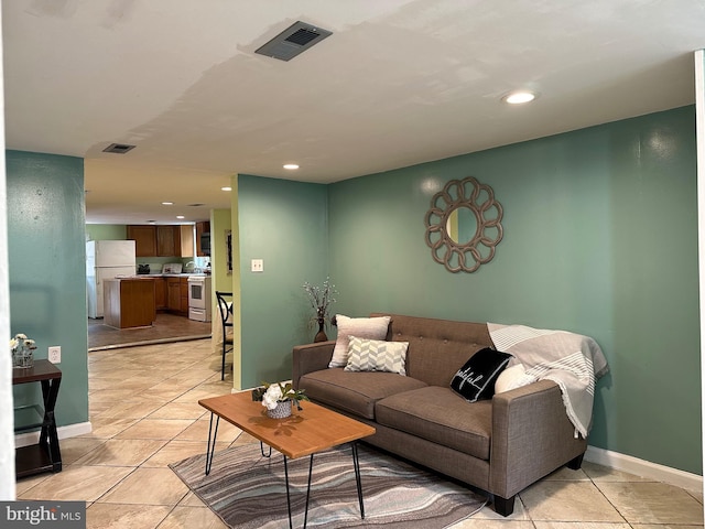 living room featuring light tile patterned floors