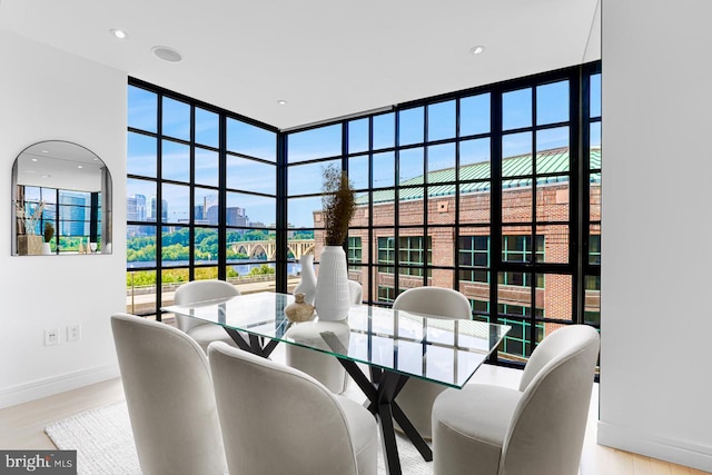 dining area featuring light wood-type flooring