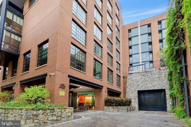 view of building exterior with a garage