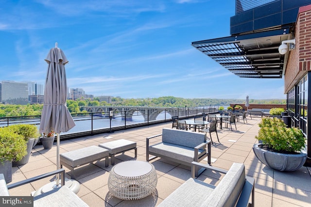 view of patio / terrace featuring a water view