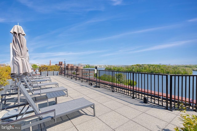 view of patio / terrace featuring a water view