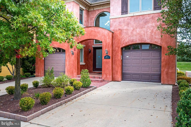 view of front of property featuring a garage