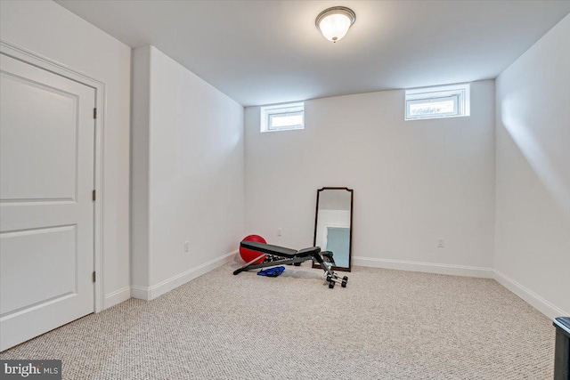 workout room featuring carpet floors