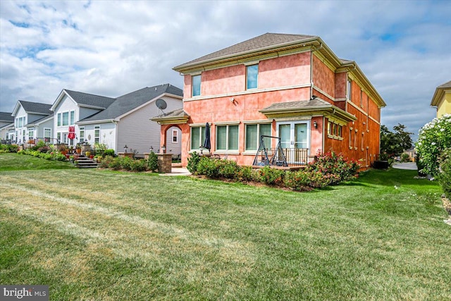 view of front of house featuring a front lawn