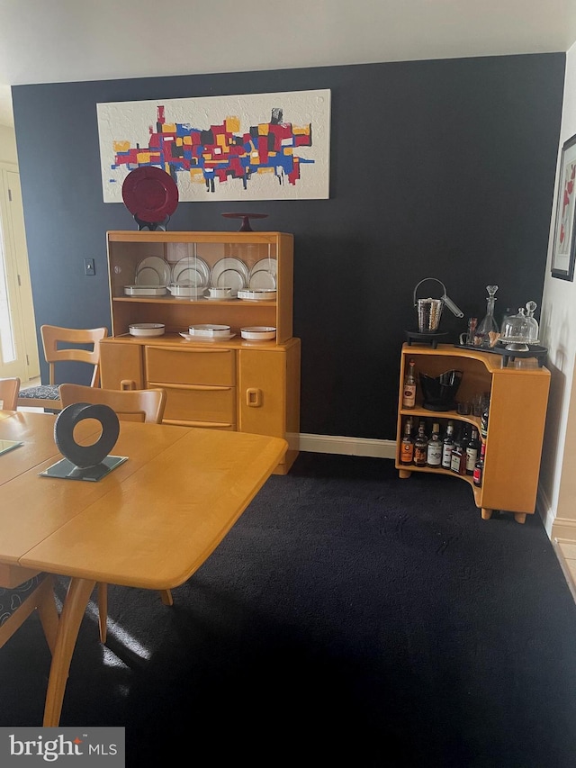 dining area with carpet