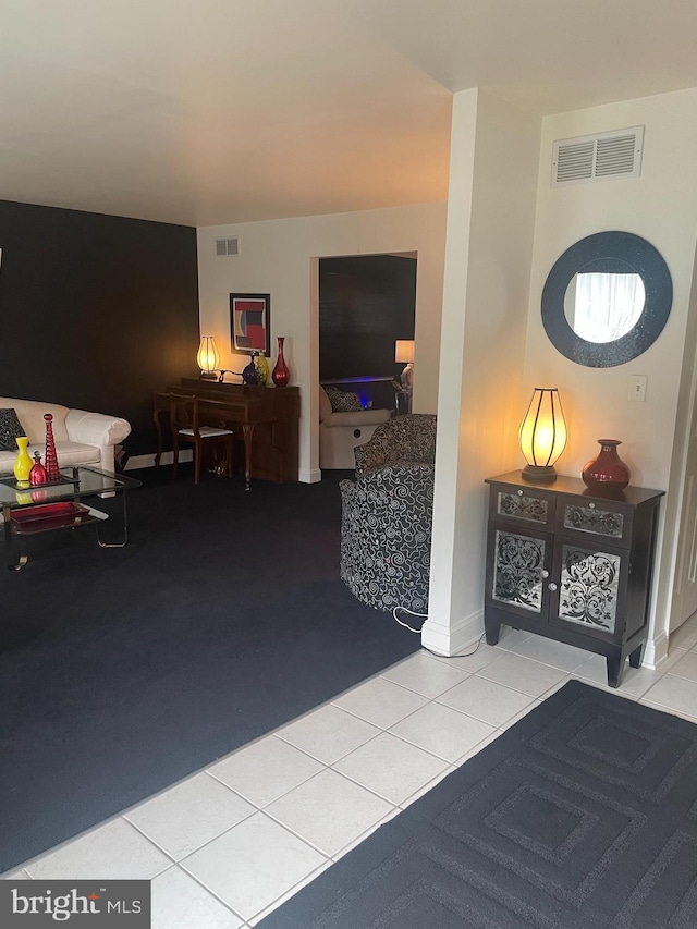 interior space featuring light tile patterned floors