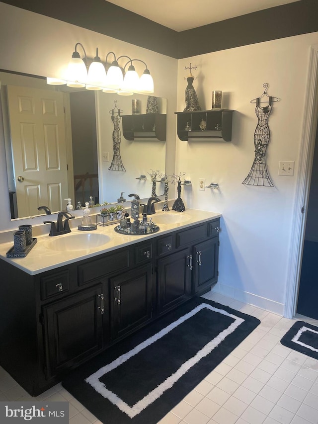 bathroom with vanity and tile patterned flooring