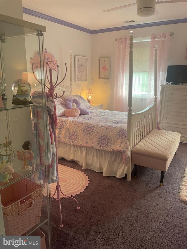 bedroom with crown molding and carpet flooring