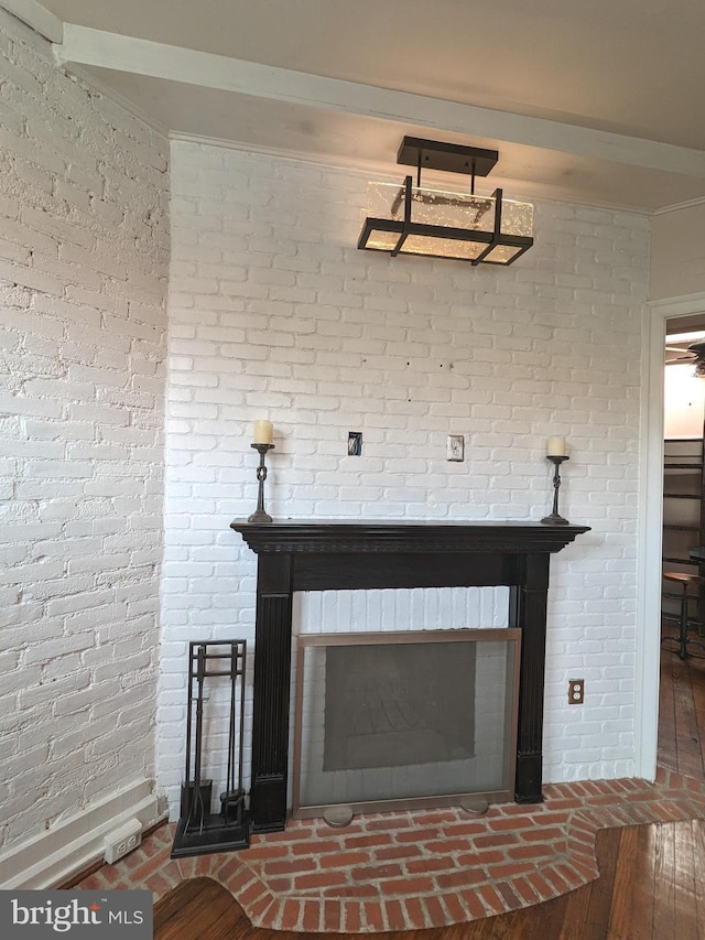 details with wood-type flooring and a fireplace