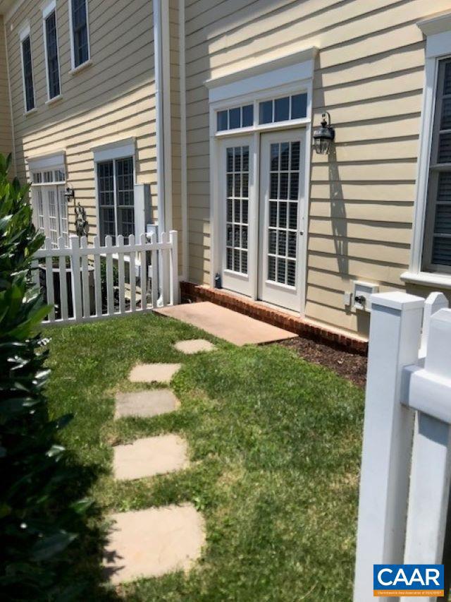 view of yard featuring french doors