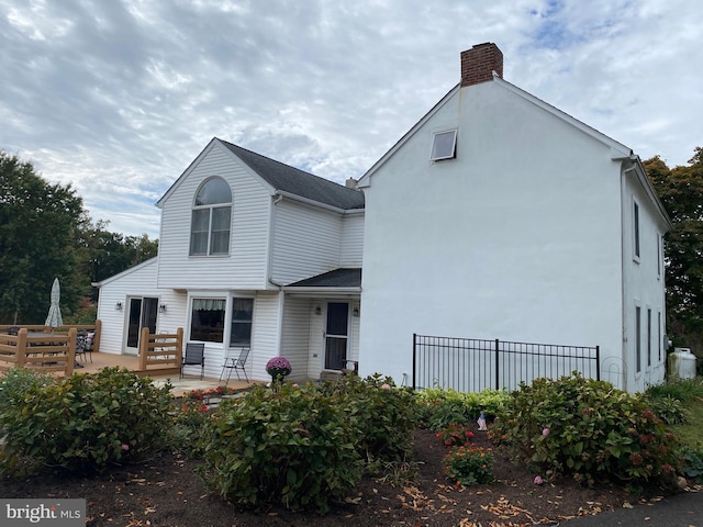 back of house featuring a patio