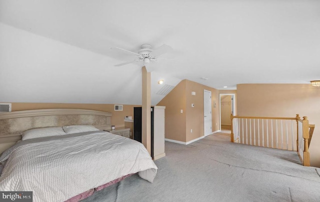 carpeted bedroom with lofted ceiling and ceiling fan