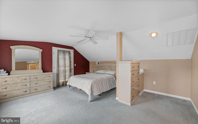 carpeted bedroom with ceiling fan and lofted ceiling