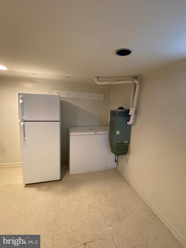 interior space featuring white fridge