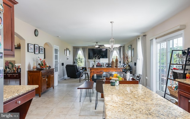 interior space featuring ceiling fan