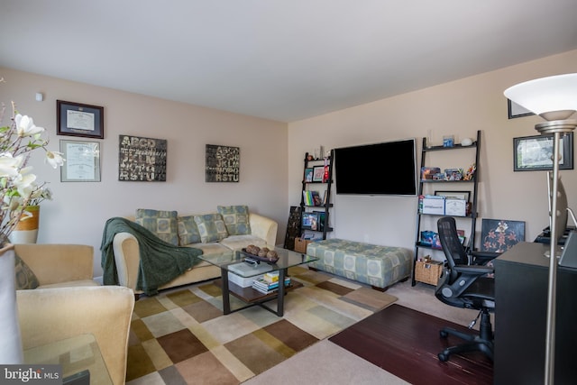 living room featuring carpet