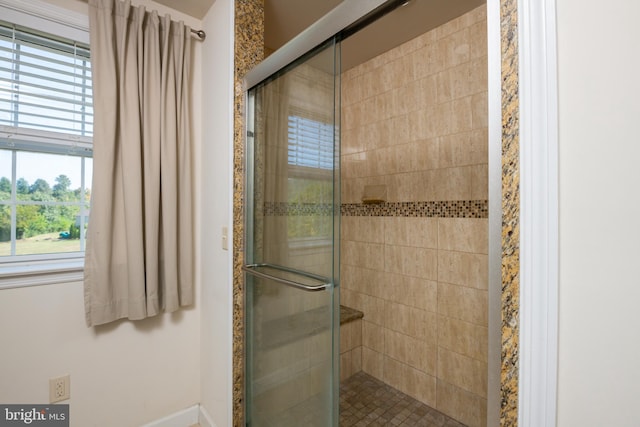 bathroom with walk in shower