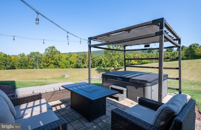 view of patio / terrace featuring a gazebo and a hot tub