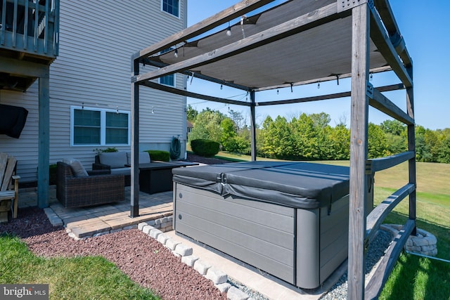 view of patio with outdoor lounge area, a gazebo, and a hot tub