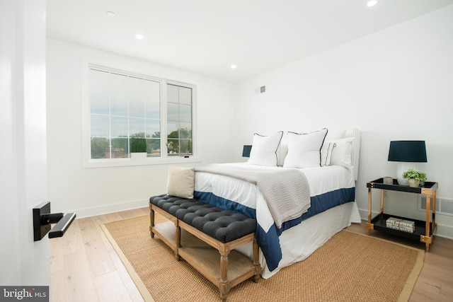 bedroom featuring light hardwood / wood-style floors